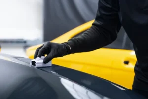 an image showing waxing a car with ppf